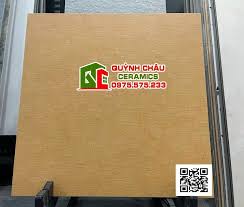 Gạch Italia 60x60 đồng chất đá mờ màu cam đất nung vân sọc caro cao cấp