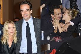 8, for a smoke break in nyc, sporting her wedding band after marrying olivier sarkozy last month. Snail Byte