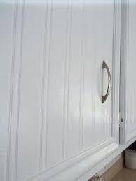 For this guest feature friday, brandi will show us how to give your kitchen a budget cabinet makeover by refacing the cabinets with a bit of wood and you 6) apply your beadboard wallpaper to the doors according the package directions. Kitchen Cabinet Refacing Using Wall Paper Hometalk