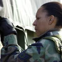 SENIOR AIRMAN (SRA) Omar Majette of the 92nd Services Squadron (SS),  Fairchild Air Force Base (AFB), Washington, puts peanut butter