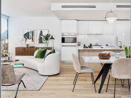 And they've been the goal in many major remodeling projects in older homes, where the objective is to join kitchen and dining room, dining room and living room, or all three into some form of communal living space or great room. 3 Unique Ways To Design An Open Concept Condo Kitchen Western Living Magazine Open Concept Condo Condo Kitchen Home Decor