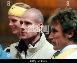 Swedish tennis player Joachim Johansson, left, French Davis Cup team  captain Guy Forget, center, and his Swedish counterpart Mats Willander meet  for the first training session Monday, Feb. 28, 2005, at the Rhenus Sports  Hall in Strasbourg, eastern ...