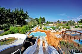 camping manoir de ker an poul piscines interieure et exterieure chauffees 3 toboggans aquatiques bain a remous 2 pataugeoires fair grounds grounds travel