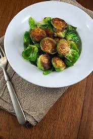 Pan Fried Brussels Sprouts With Sriracha Honey Lime Brussel Sprouts Fried Brussel Sprouts Recipes