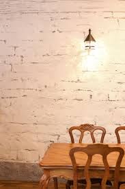 可愛らしい石積みの壁面で海外カフェのような雰囲気に リノベーション おしゃれ リビング 壁 リノベーション リフォーム