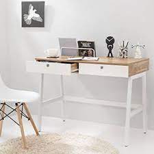 The table is manufactured from natural russia imported pinewood. Terry Study Table Urban Ladder