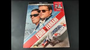 American car designer carroll shelby and driver ken miles battle corporate interference, the laws of physics and their own personal demons to build a revolutionary race car for ford and challenge ferrari at the 24 hours of le mans in 1966. Unboxing Ford Vs Ferrari Target Exclusive 4k Blu Ray Digipack Youtube
