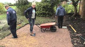 Fill the gaps between slabs with more sand. Diy How To Lay Paving Slabs Patio With Philippa Tuttiett Youtube