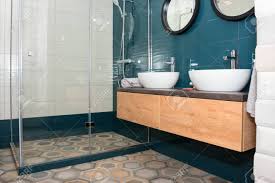 wooden shelf, two sinks standing