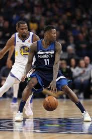 Tattoos are pretty popular in the nba. Jamal Crawford Of The Minnesota Timberwolves Handles The Ball During The Game Against The G Golden State Warriors Pictures Golden State Warriors Seattle Sports