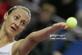 France's Mary Pierce hits the ball back to her compatriot Emile Loit...  News Photo
