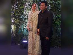 Photo of ar rahman with his wife saira banu, a r rahman beautiful wife saira banu. A R Rahman Arrives With Wife Saira Banu