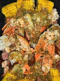 In a large pot, bring the water, old bay, bay leaves and butter to a boil. Garlic Butter Seafood Boil Razzle Dazzle Life