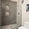 Build your walk in bathroom shower into the alcove or tuck it into an eave to make use of the walls as natural partitions in the room. 1