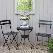 These black french bistro chairs are suitable for year round use inside or outside. Parisian Cafe Chairs In Black How To Create One Chic Outdoor Oasis Now Hello Lovely