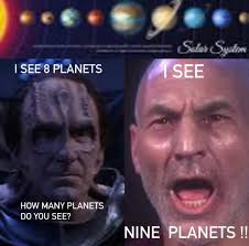 Pluto's status as a planet in our solar system