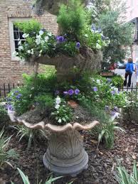 All the runoff from the previous pot drips into the plants below, so you only need to place a little dish the whole style of this diy tiered hanging pots is wonderful and amazing!i love your idea!thank you. 3 Tier Flower Pot In Entrance Plot Bild Von Husk Restaurant Charleston Tripadvisor