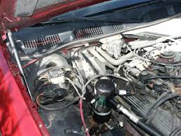 A lincoln town car's air suspension uses a small, separate air compressor under the driver's side left fenderwell, and air lines run to the air bags. Ford Crown Victoria A C R134a Refrigerant Refill