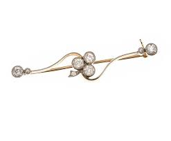 gold shamrock brooch