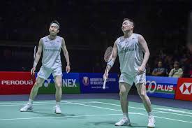 Quarter-final woes for Malaysia as Aaron-Wooi Yik fall to Chinese pair, Tang Jie–Ee Wei retire injured