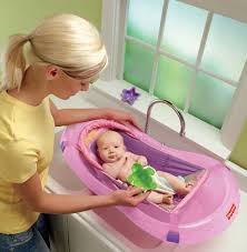 A unique flush drain plug makes cleanup a breeze. 746775045425 Fisher Price 3 Stage Pink Sparkles Bath Tub