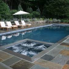 Hot Tub In Pool The Whole Thing Gets Covered By The Auto Pool Cover Stone Pool Deck Rectangle Pool Pool Patio