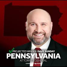 Dave Sunday won the election for Pennsylvania's Attorney General. Can you  guess which nondescript friendly bald guy is Dave? No cheating, Yinz guys.