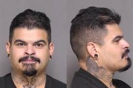 Rochester man charged with two felonies following hotel standoff