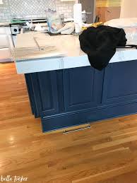 Navy cabinets and expanded space breathe new life into a 1940s kitchen. Blue And White Two Toned Kitchen Cabinets Bella Tucker