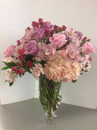 Strapless peach chiffon bridesmaid dresses. Roses Spray Roses Hydrangea Alstroemeria Lilies And Cymbidium Orchids Flower Arrangements Cymbidium Orchids Wood Flowers