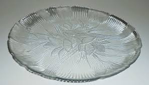 A set of (12) 8″ clear glass plates, center plain, edged with fleur and branch design $90.00. Vintage Platter Clear Glass Canterbury Arcoroc Floral Crocus Serving Platter Large Round Glass Tray Dessert Tray Cake Plate Clear Glass Plates Clear Glass Platters