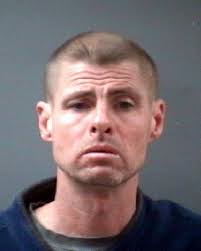 Bloody woman attacks police officer