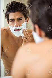 Close Up Of Young Man Applying Shaving Foam In Front Of Bathroom Stock Photo Picture And Royalty Free Image Image 54646706