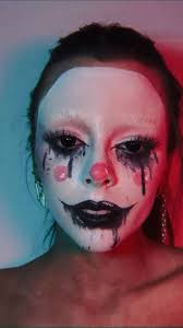 Transforming into a Jack-O-Lantern Makeup Look