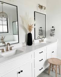 The floating white oak vanity stands out in the mostly white bathroom. White Bathrooms Can Be Interesting Too Fresh Design Ideas