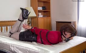 Sandra Gibbons on X: New self-bondage video just posted - in my sweater,  latex skirt, and leading up to this pvc hood, always play safe and have  plenty of back-up releases when