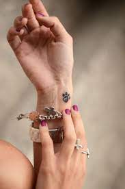10 Cute Cat Tattoo Designs Cat Tattoo Designs Tattoos Pawprint Tattoo