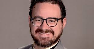 US priest sues Ottawa County for right to say prayers