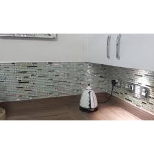 You can pair this tile with many other products, including ones in the silhouette series, to create your own lavish escape. Iridescent White Glass Tile Wave Pattern Silver Stainless Steel Glossy