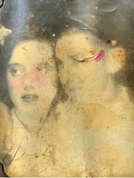 The picture being posted recently resurfaced in my Mother's collection. The  original is small, measuring 3.5 inches X 2.5 inches. A surface blemish is  due to a layer of the picture being