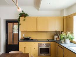 Dining table on the white stalk with a round wooden top. Steal This Look A Modern Country Kitchen In Hudson New York Remodelista