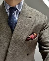 Flip over and insert the pocket square into your breast pocket, pointy side up. The Best Way To Fold A Pocket Square Put This On