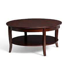 Gold medium round glass coffee table set with nesting tables. Chloe Round Coffee Table Mahogany Stain Pottery Barn Havenly