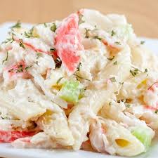 Easy crab salad recipe comes together really quickly with the imitation crab and can be prepared in advance to take for lunch to work or school. Pasta Seafood Salad Recipe Sea Food Salad Recipes Seafood Recipes Seafood Salad Pasta
