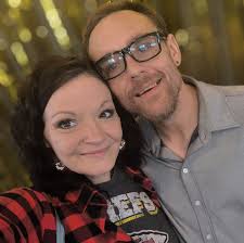 Who are good tattoo artists in Kansas City for red ink and fine lines?