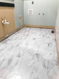 Beautiful cedar glazed porcelain tile. The Best Faux Marble Tile Blesserhouse Com A Dated Powder Room Floor Gets A Modern Classic Re Marble Tile Floor Marble Flooring Design Powder Room Makeover