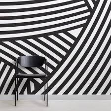 Black And White Geometric Wall Design Divert Striped Geometric Wall Mural In 2020 Wall Murals Geometric Pattern Wallpaper White Wallpaper