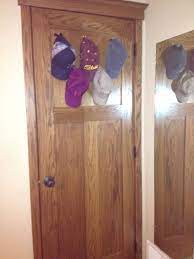 Hiding Place For Hats This Easy Ten Minute Project Involved Using New Clear 3m Command Hooks On The Back Of My B Hat Hanging Home Organization Behind The Door