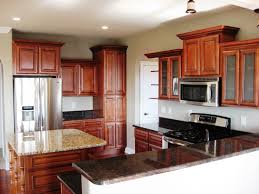 Utilize drawers and open storage within the island to increase the kitchen's storage capacity, which will leave long runs of counter space to make prep a breeze. L Shaped Small Kitchen Design Layout 10x10 Novocom Top