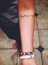'bella lolo' tattoo just below his chest. Tattoo Daughter Of A King In My Mothers Hand Writing For I Am A Child Of God And He Is King Of Kings Writing Tattoos Tattoos Tattoos For Daughters